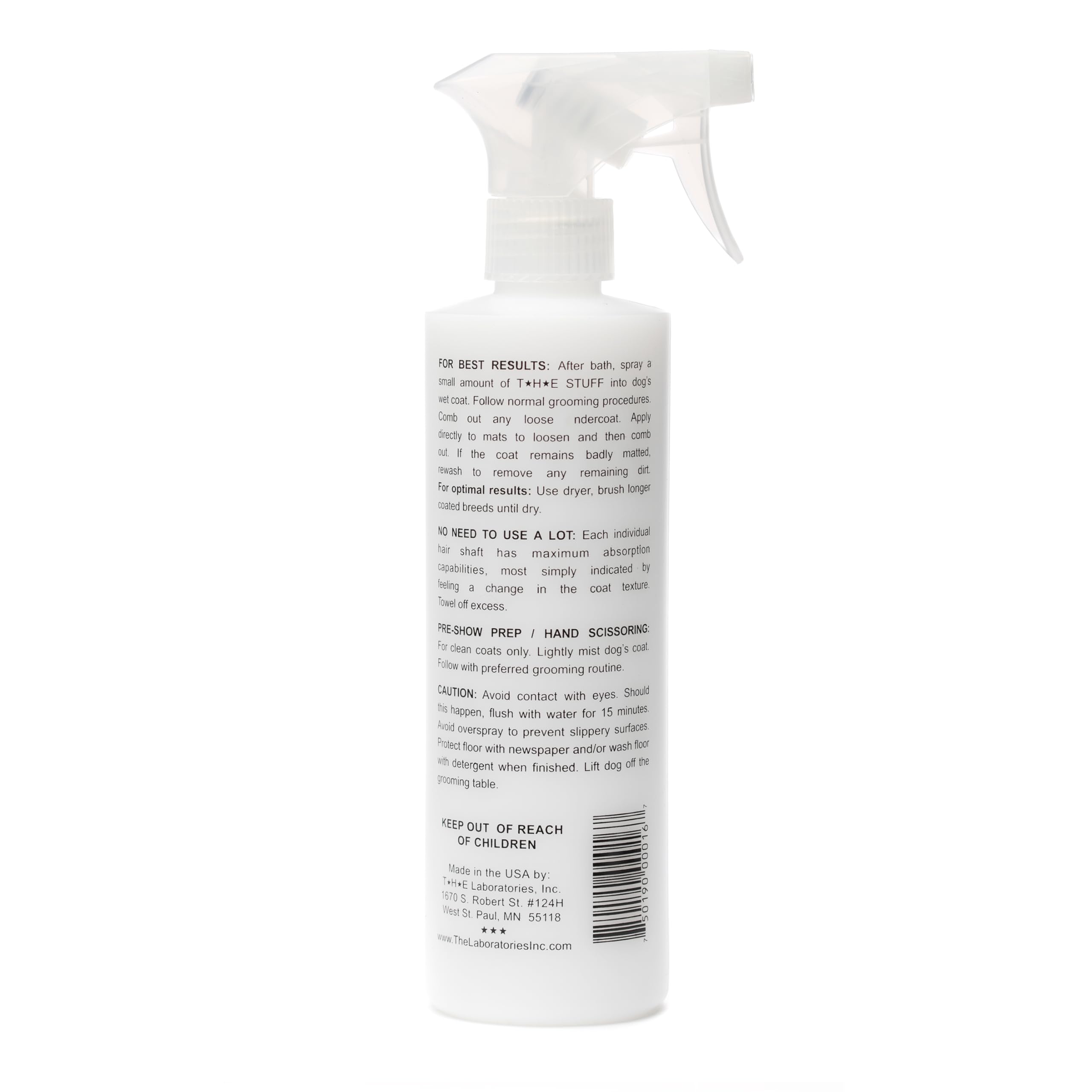 The Stuff Leave-in Dog Conditioner detangler spray action on coat for quick detangling.