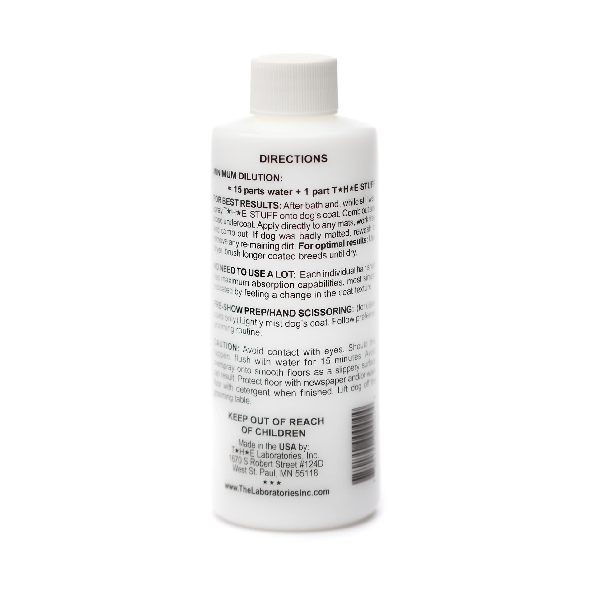The Stuff Detangler spray nozzle in action for quick, stress-free grooming.