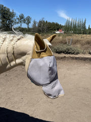 The Sunny Zebra UV-blocking mesh coverage protects light-skinned horses while maintaining visibility.