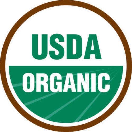 Thunder Acres oat seed front label on shelf; premium non-GMO oats for pets.