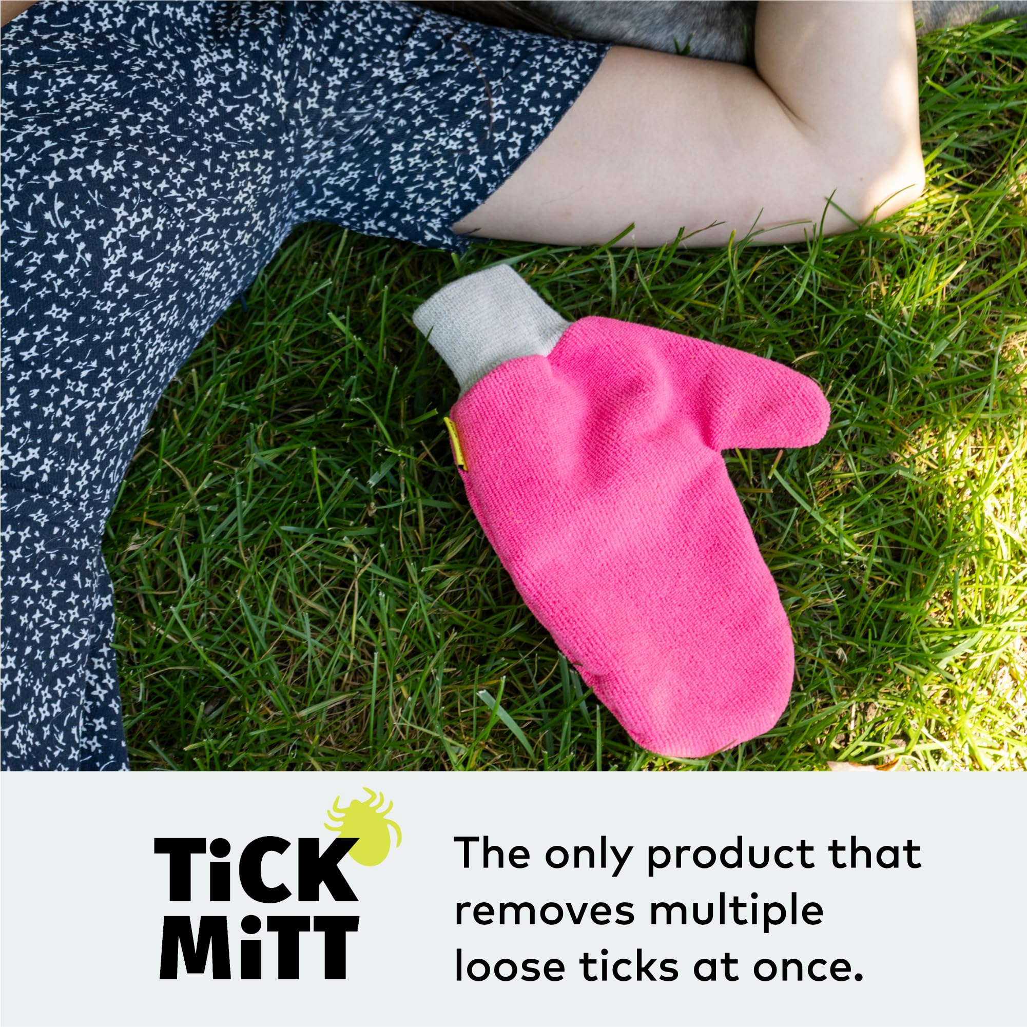 TiCK MiTT Pink Tick Removal Glove on a pet, safe for sensitive skin