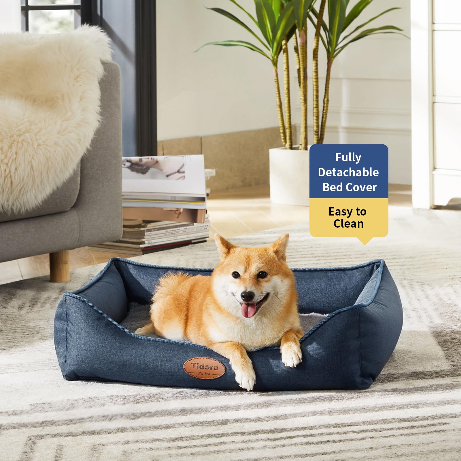 Tidore navy dog bed with removable washable cover for easy cleaning.