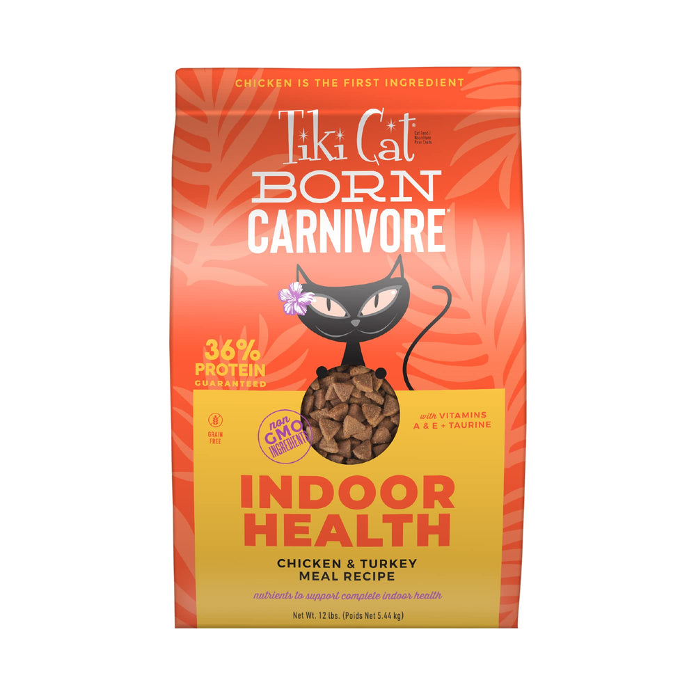 TIKI PETS Tiki Cat Born Carnivore Indoor Health kibble in bowl highlights real chicken flavor.