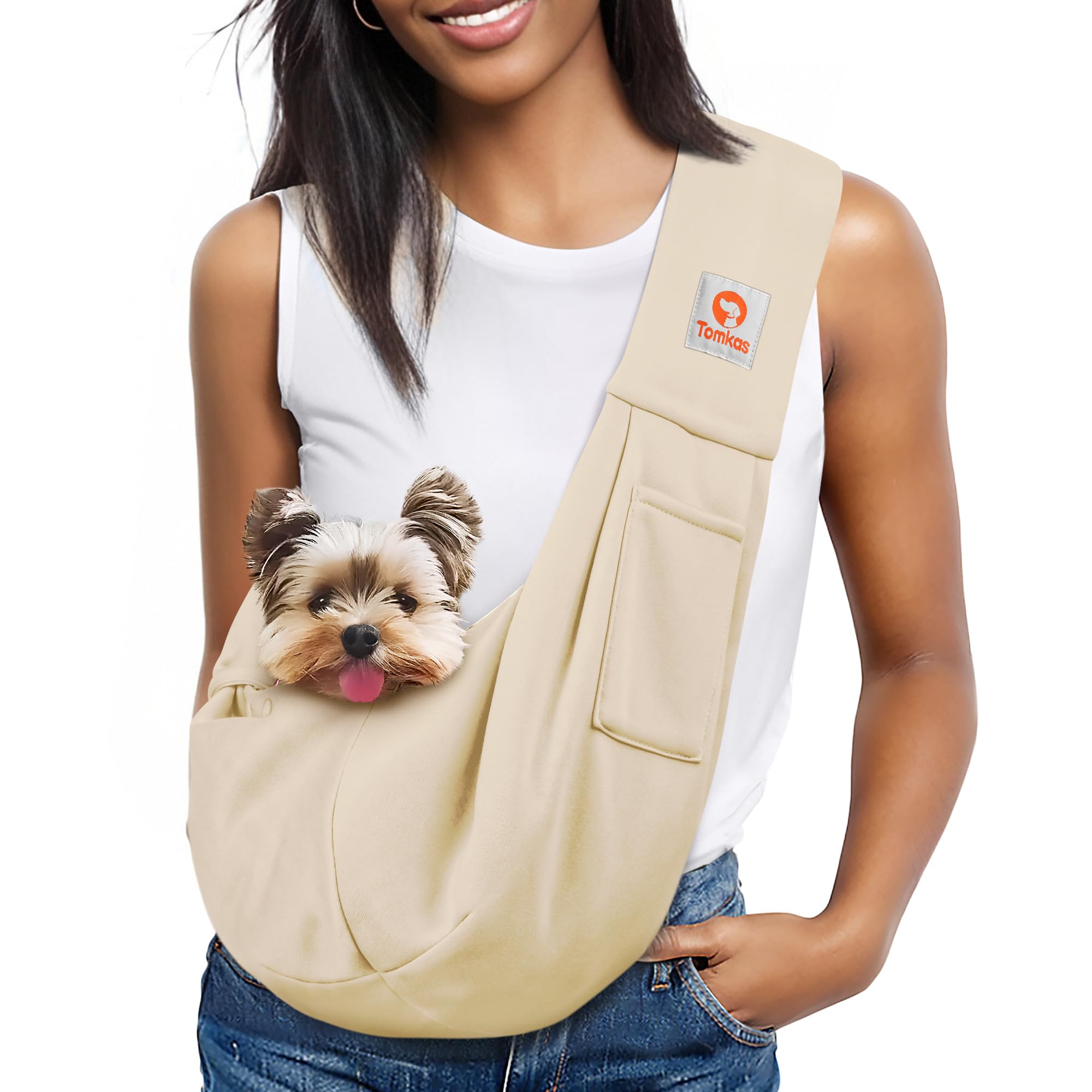 TOMKAS sling in action during loading a small pet into the carrier
