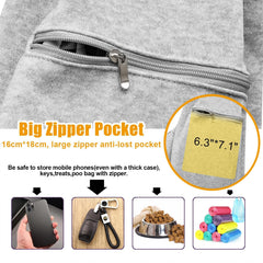 Tomkas small dog sling carrier zip pocket front for secure storage on outings.