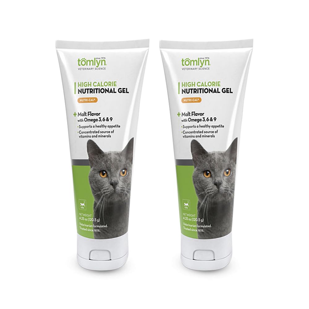 tomlyn nutri-cal tube being squeezed for cat nutrition