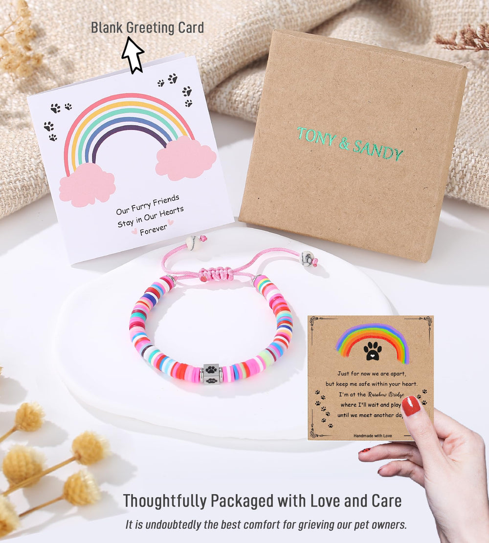 TONY & SANDY paw charm reminder worn on wrist.