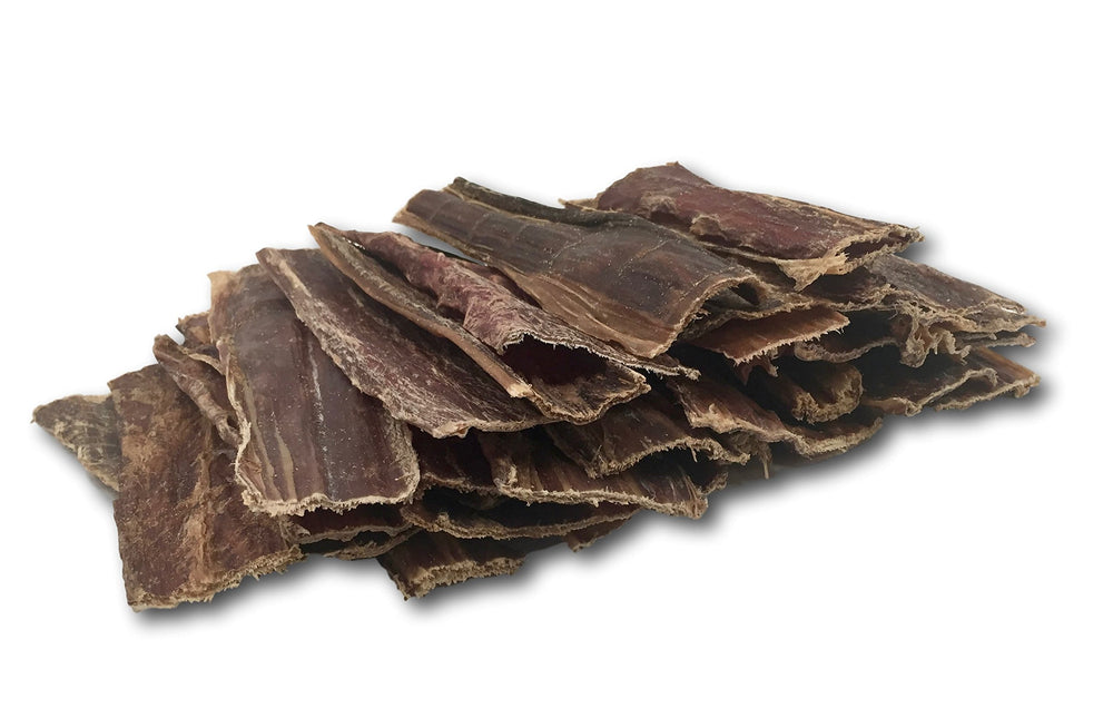 Top Dog Chews free-range jerky pack with dog demonstrates easy rewards during training.