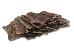 Top Dog Chews free-range jerky pack with dog demonstrates easy rewards during training.