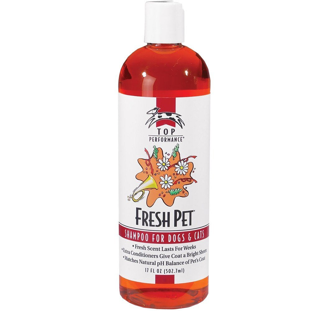 Top Performance Fresh Pet Shampoo bottle pour highlights easy grooming with a long-lasting, clean scent.