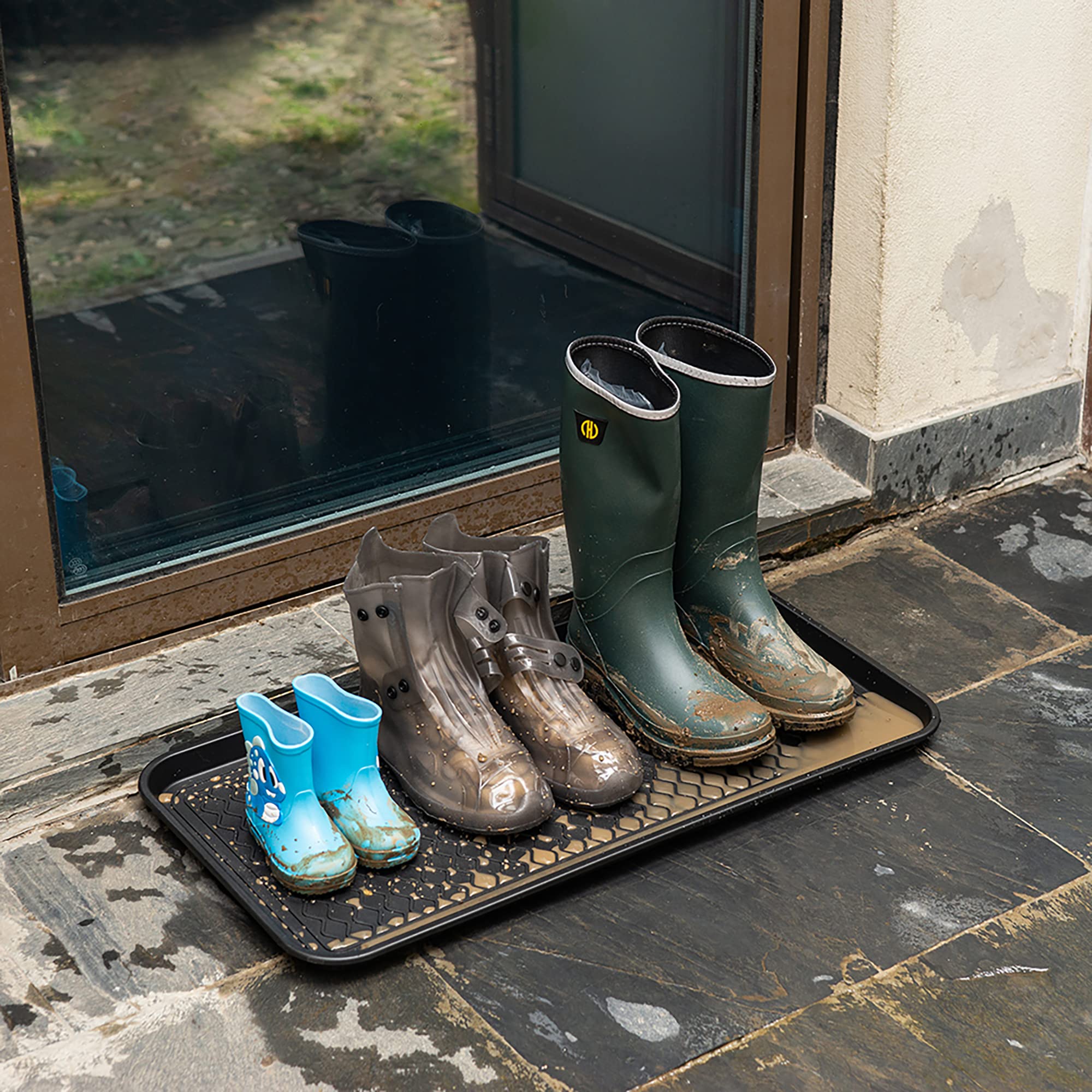 Trimate boot tray all-black material blends with decor while protecting floors.