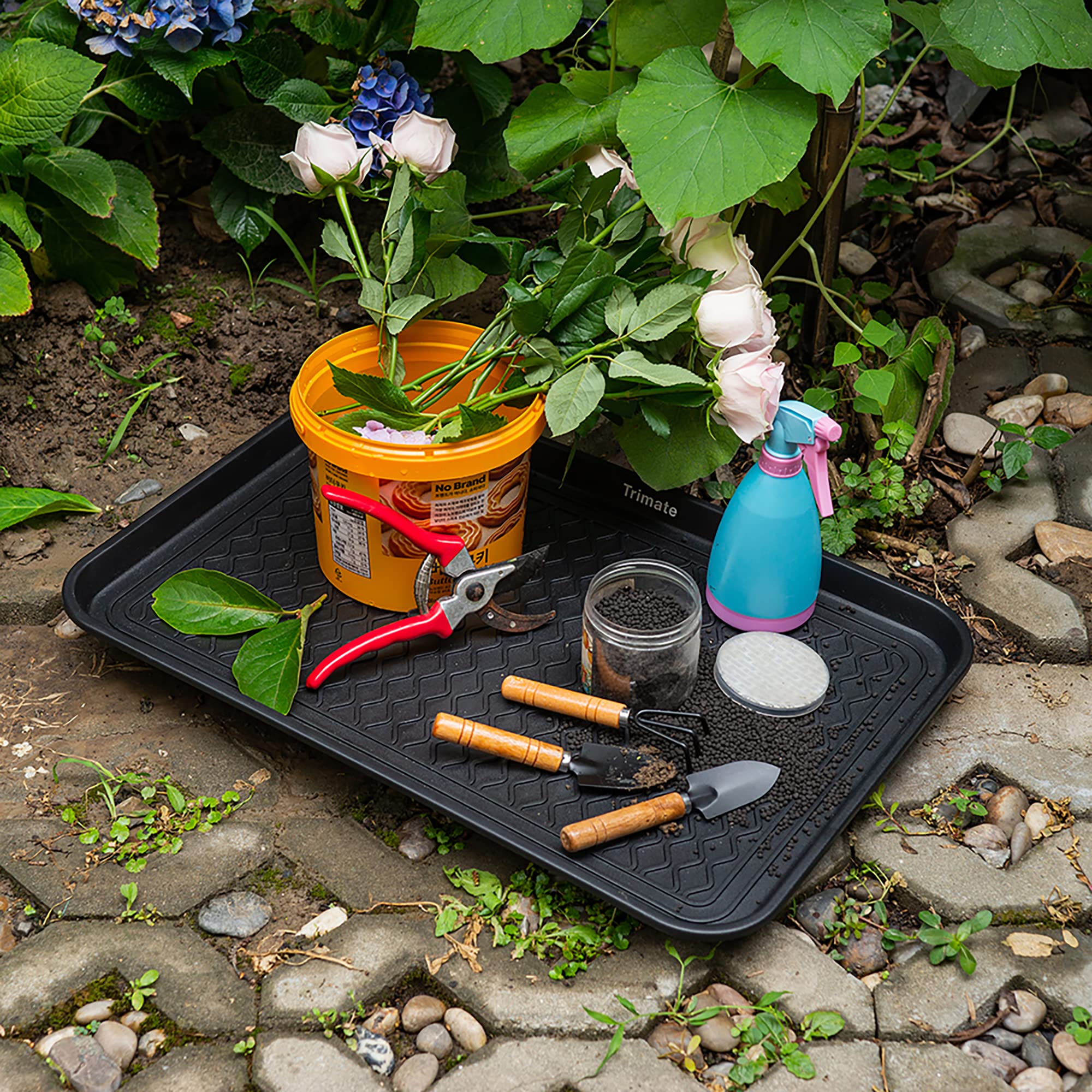Trimate boot tray easy-clean design rinses away dirt and debris.