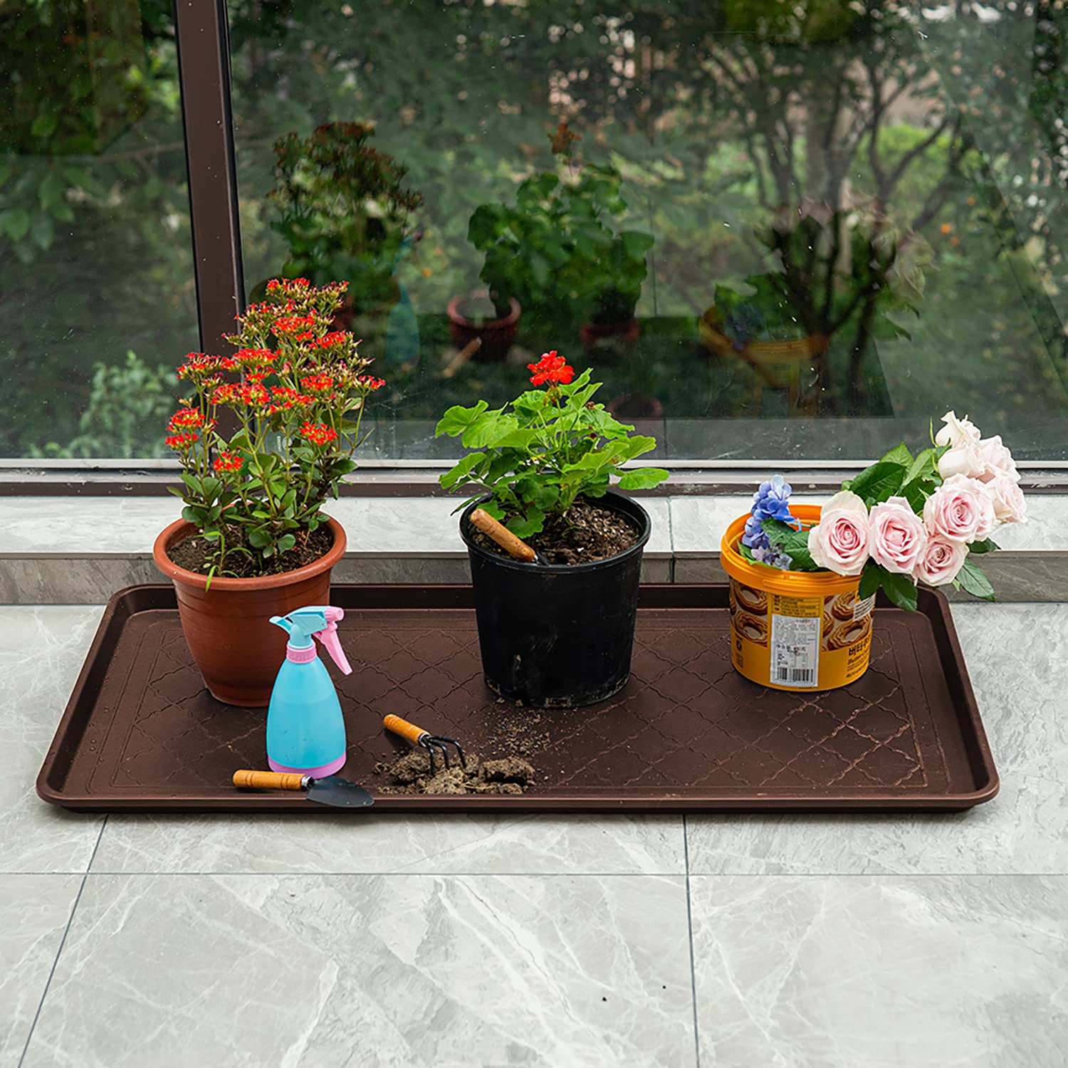 Trimate boot tray used as pet bowl mat in mudroom