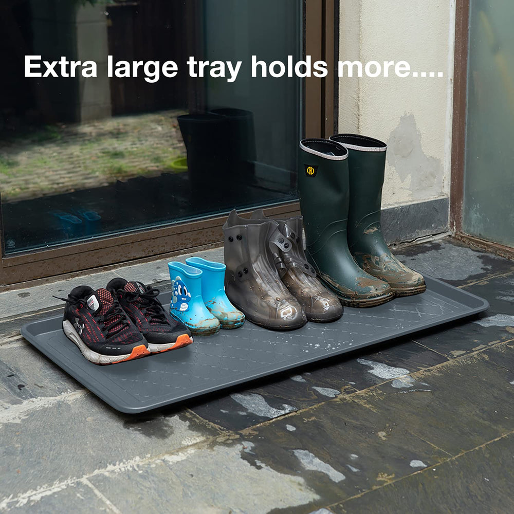 Trimate boot tray with raised edge catches spills and dries boots faster.