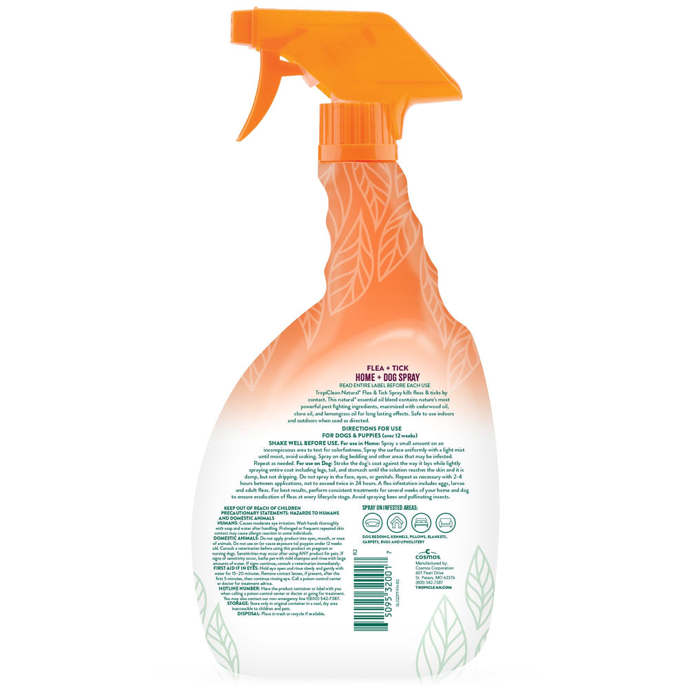 TropiClean natural spray bottle—visible mist for pets and home surfaces.