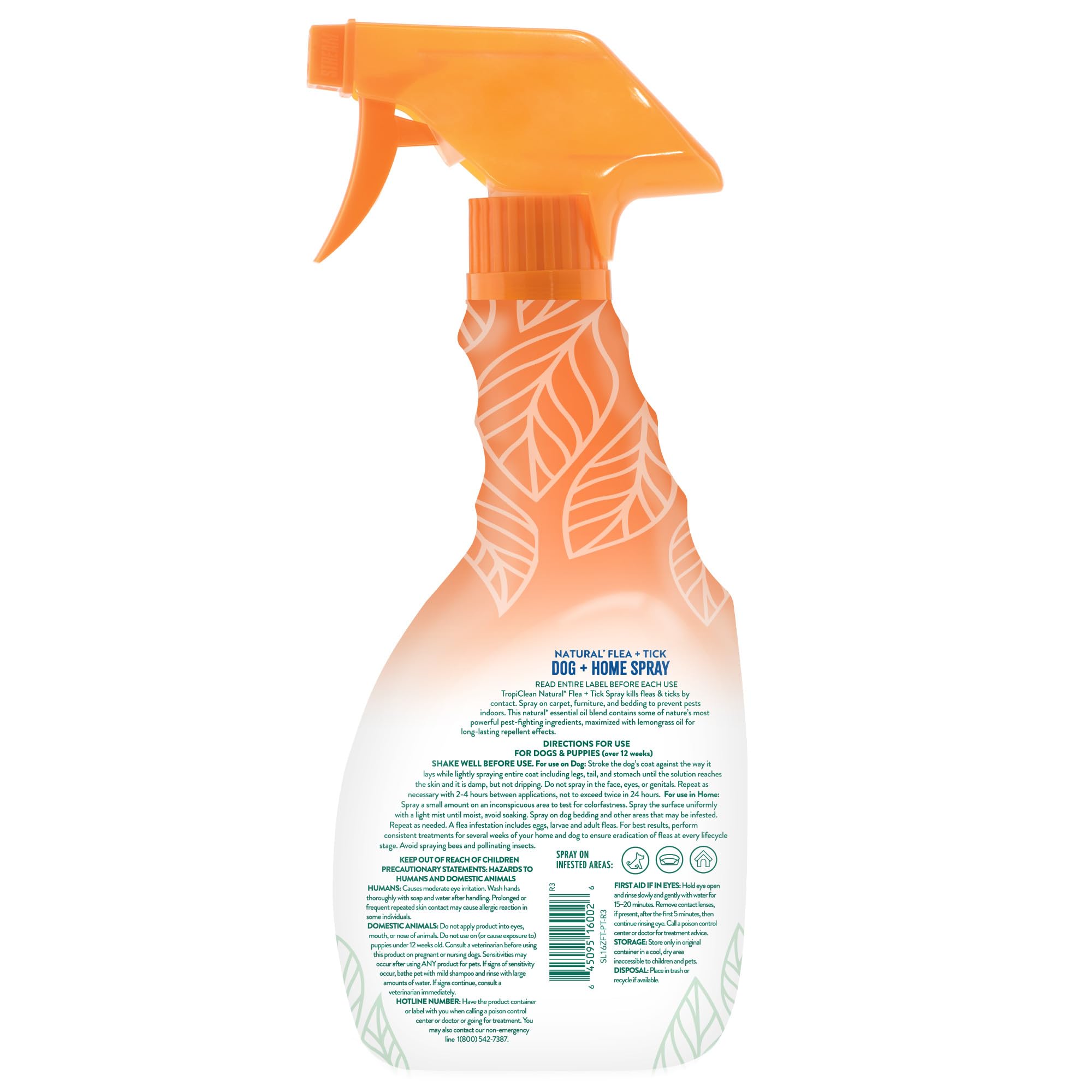 Close-up of TropiClean spray bottle applying to a dog's coat.
