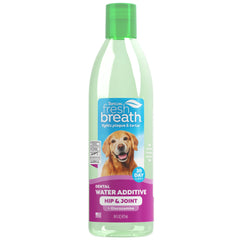 TropiClean Fresh Breath Water Additive bottle pour for easy daily use and fresher breath.