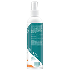 TropiClean No Chew Spray bottle at an angle for easy application.