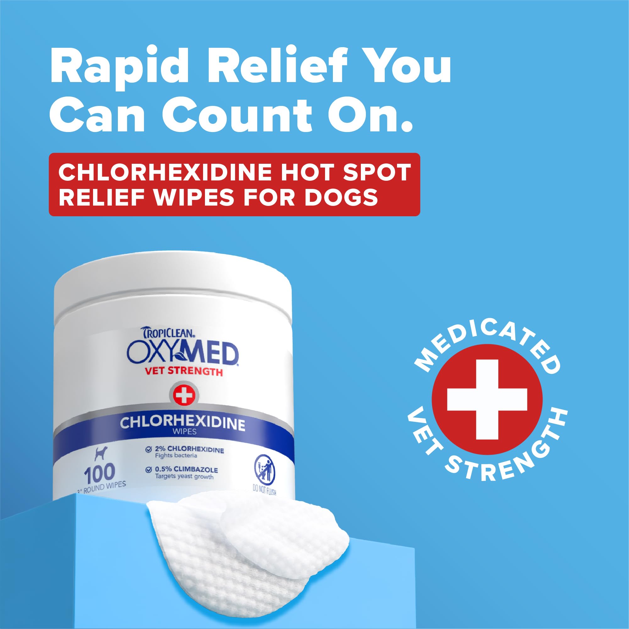 TropiClean OxyMed wipes on facial folds for quick, gentle cleansing.