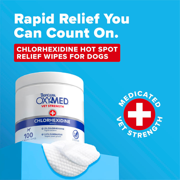 TropiClean OxyMed wipes on facial folds for quick, gentle cleansing.