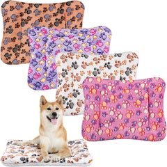 Tuanse four-pack ultra-soft pet bed mats with paw pattern for cozy crate use.