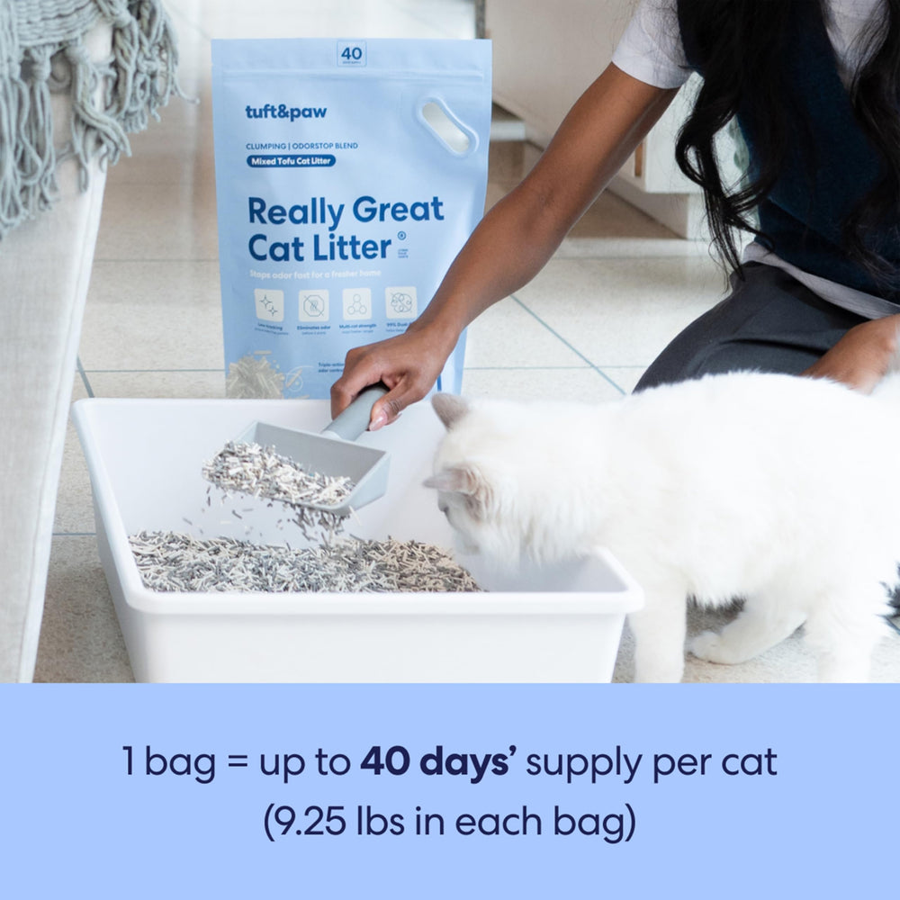 Tuft & Paw OdorStop charcoal odor-control image suggests natural smell reduction.