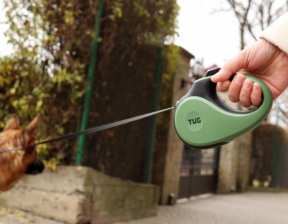 TUG 16 ft nylon tape extended for added reach and control during walks.