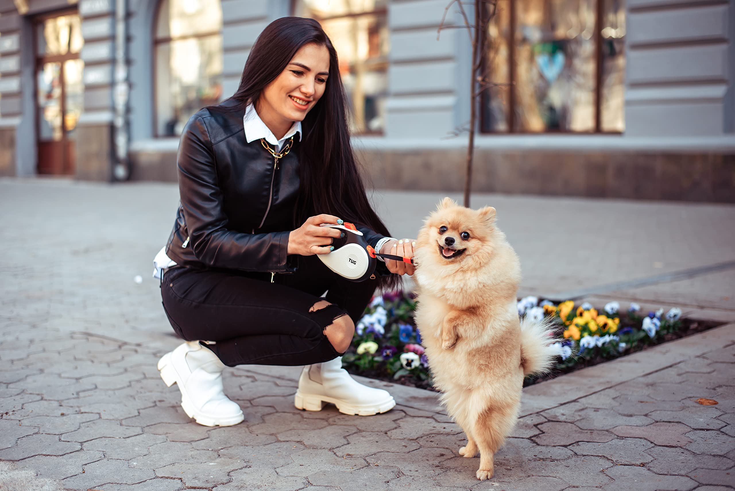 TUG leash with heavy-duty internal coil for smooth retraction over time.