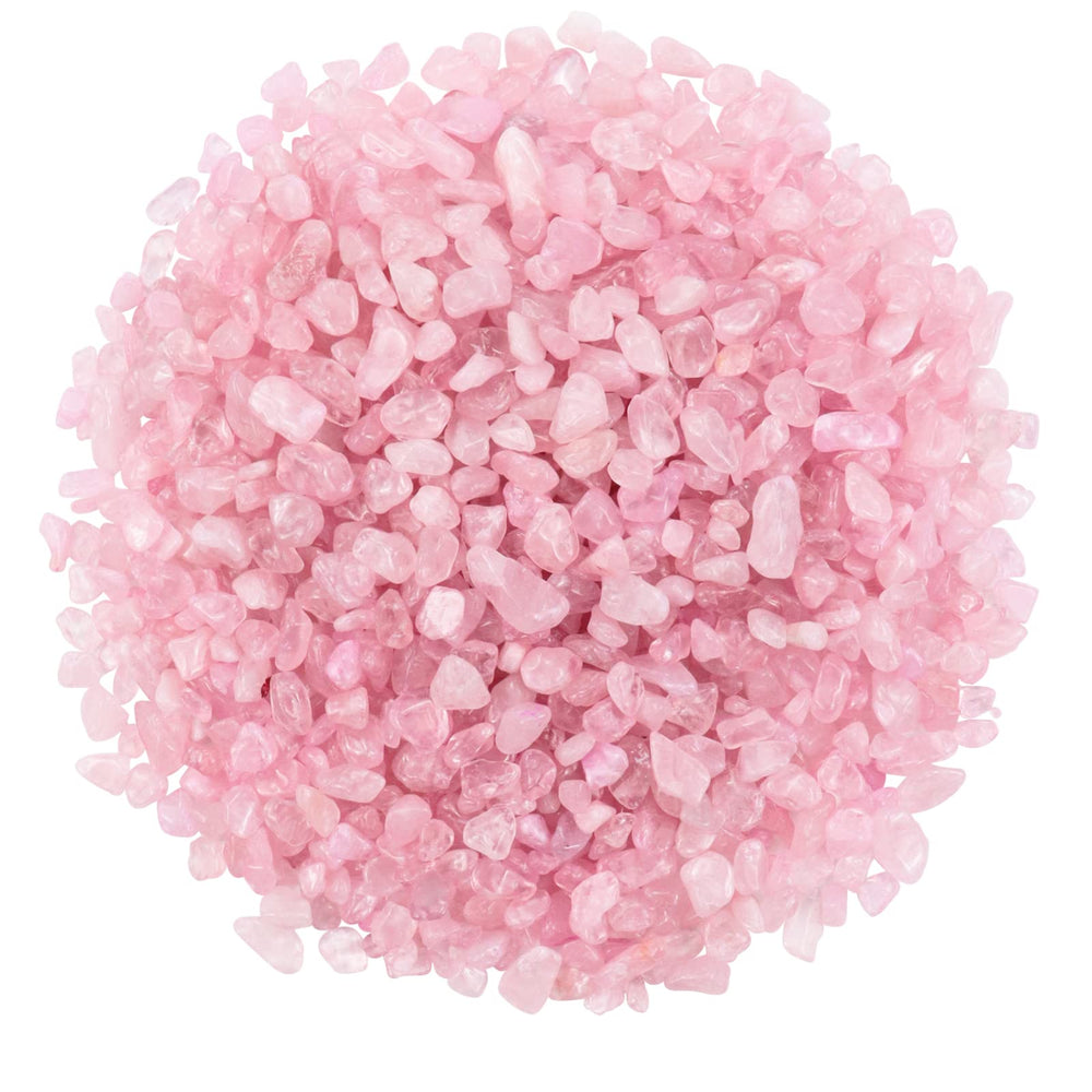 Twdrer rose pink crystal chips in a clear bowl showing natural color and texture