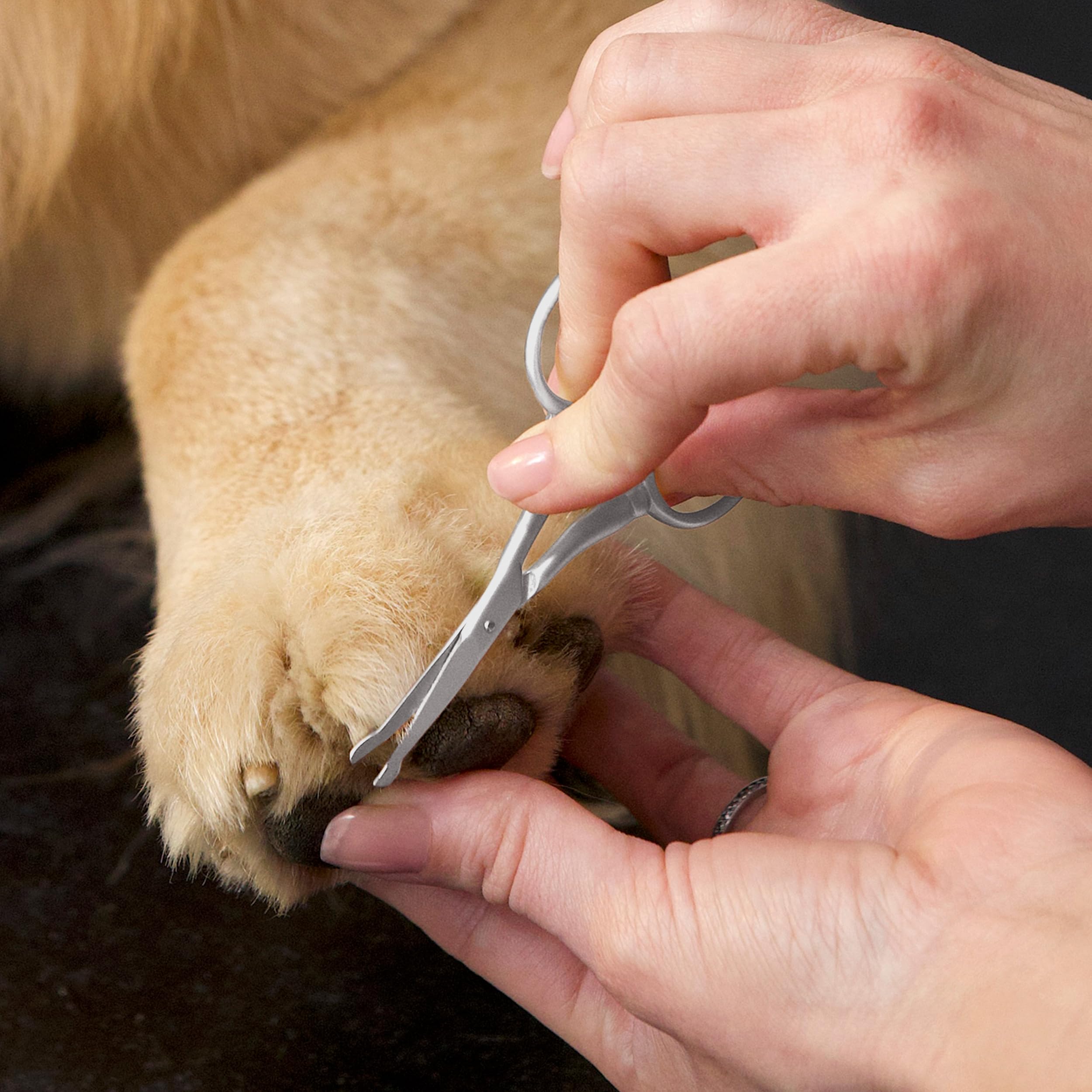Lightweight Tweezerman scissors reduce hand fatigue during grooming
