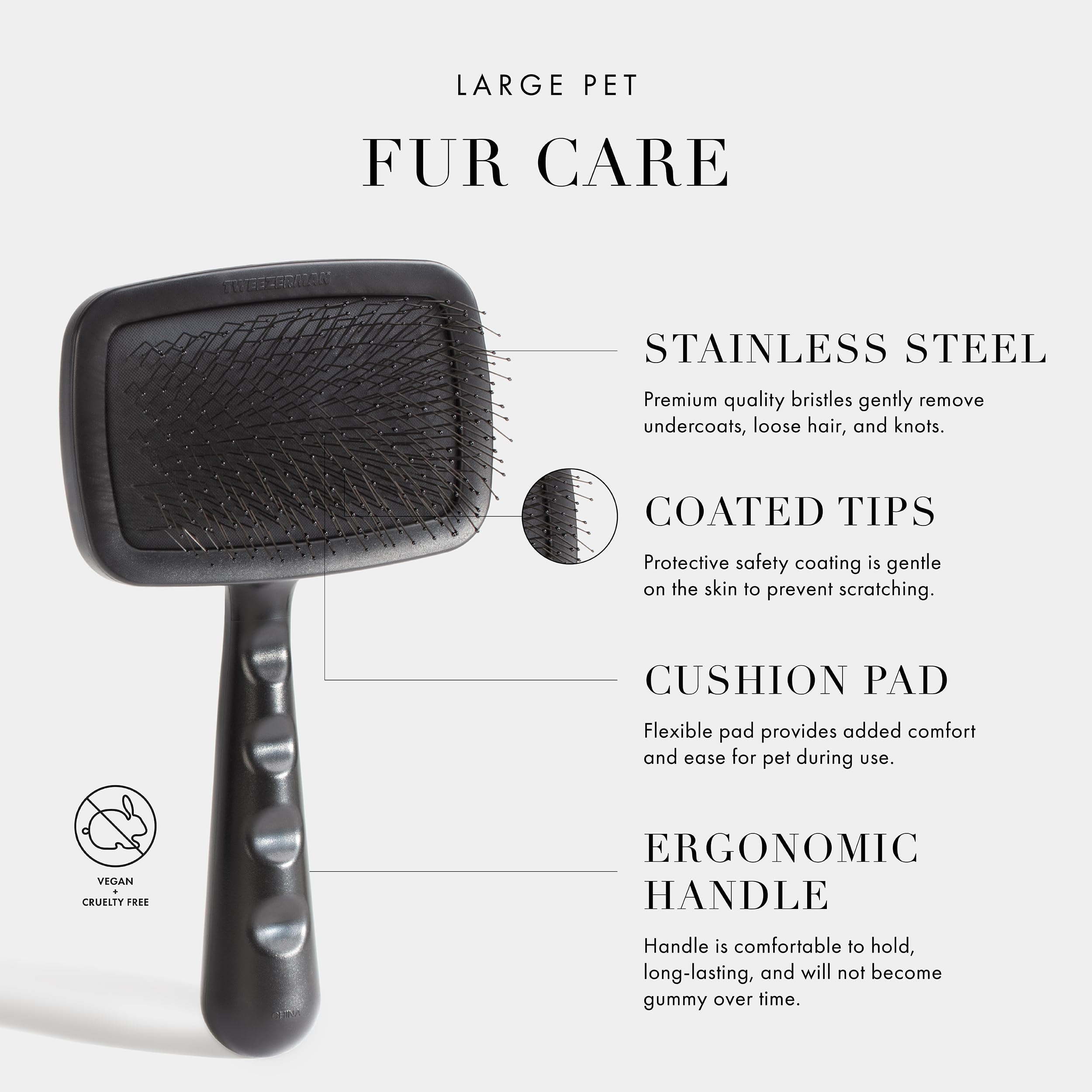 Tweezerman slicker brush with cushion pad adds comfort during grooming.
