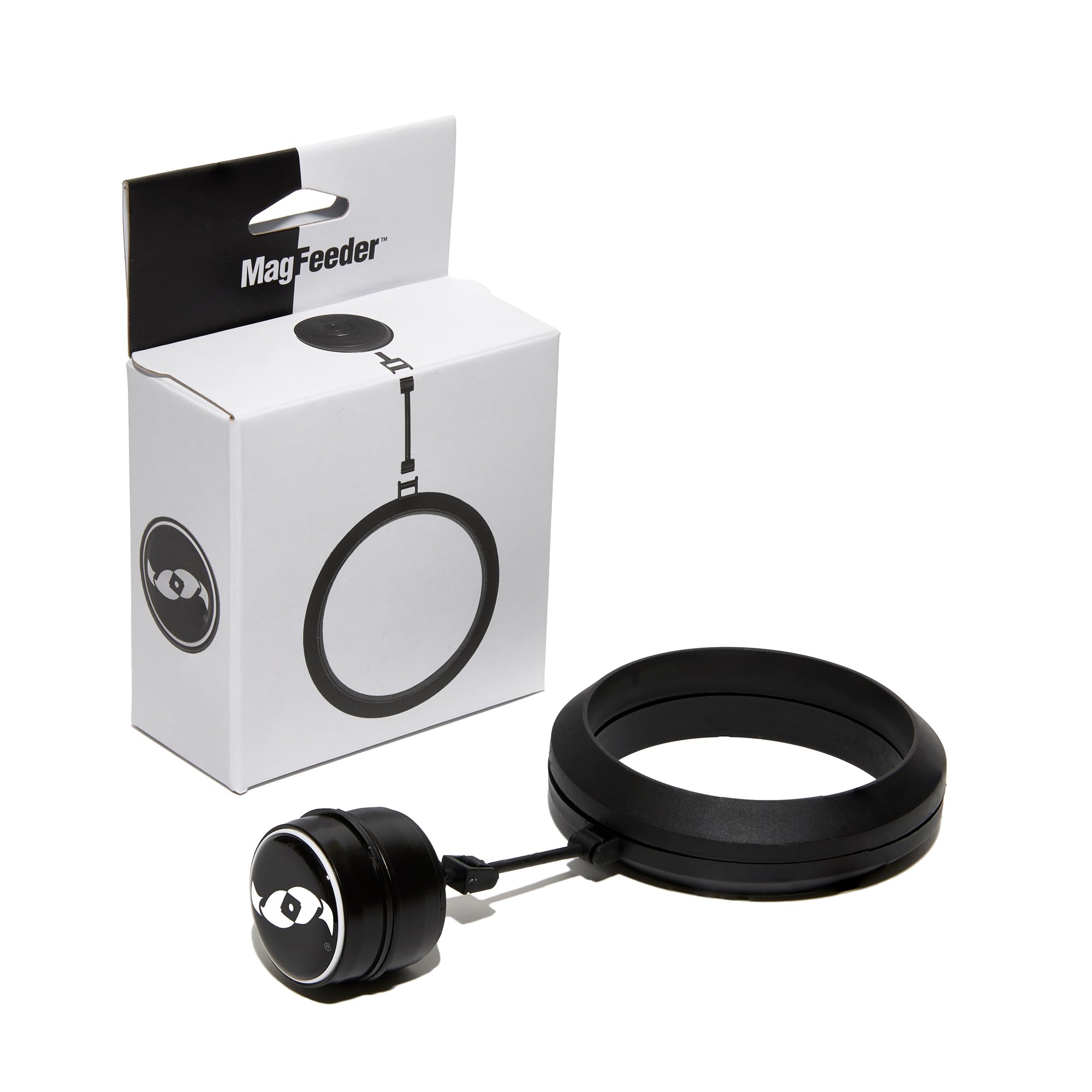 Two Little Fishies MagFeeder magnetic ring attached to aquarium glass for precise feeding.