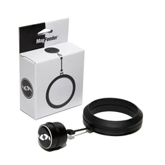 Two Little Fishies MagFeeder magnetic ring attached to aquarium glass for precise feeding.