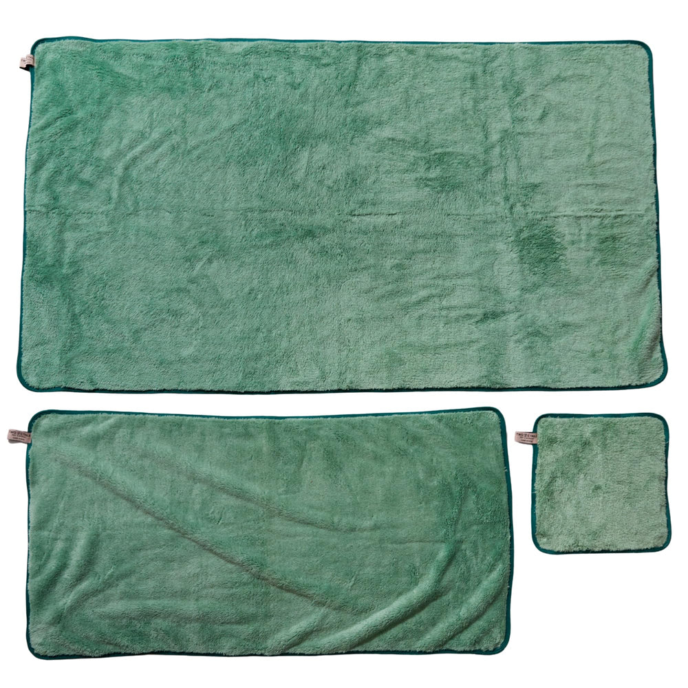 Two Tails Pet Company Pet N’ Dry travel-friendly towel fits bags for on-the-go cleanups.
