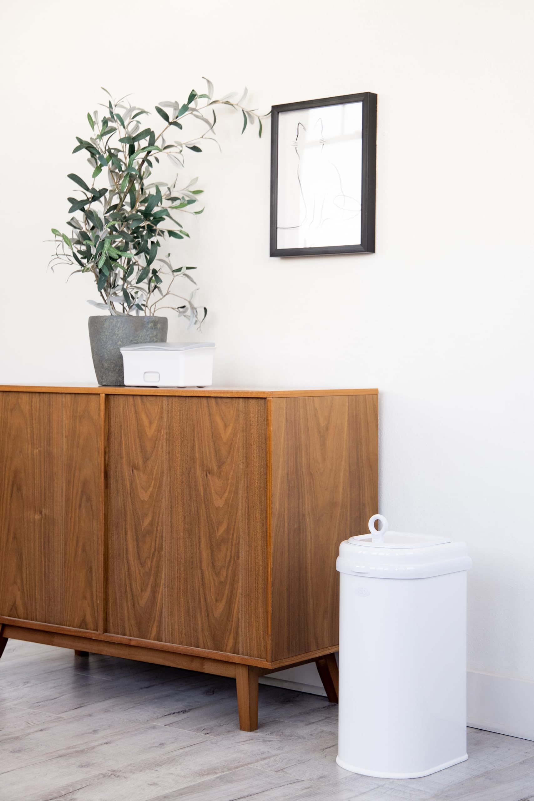 Ubbi Pet Waste Pail includes scoop for hygienic waste removal