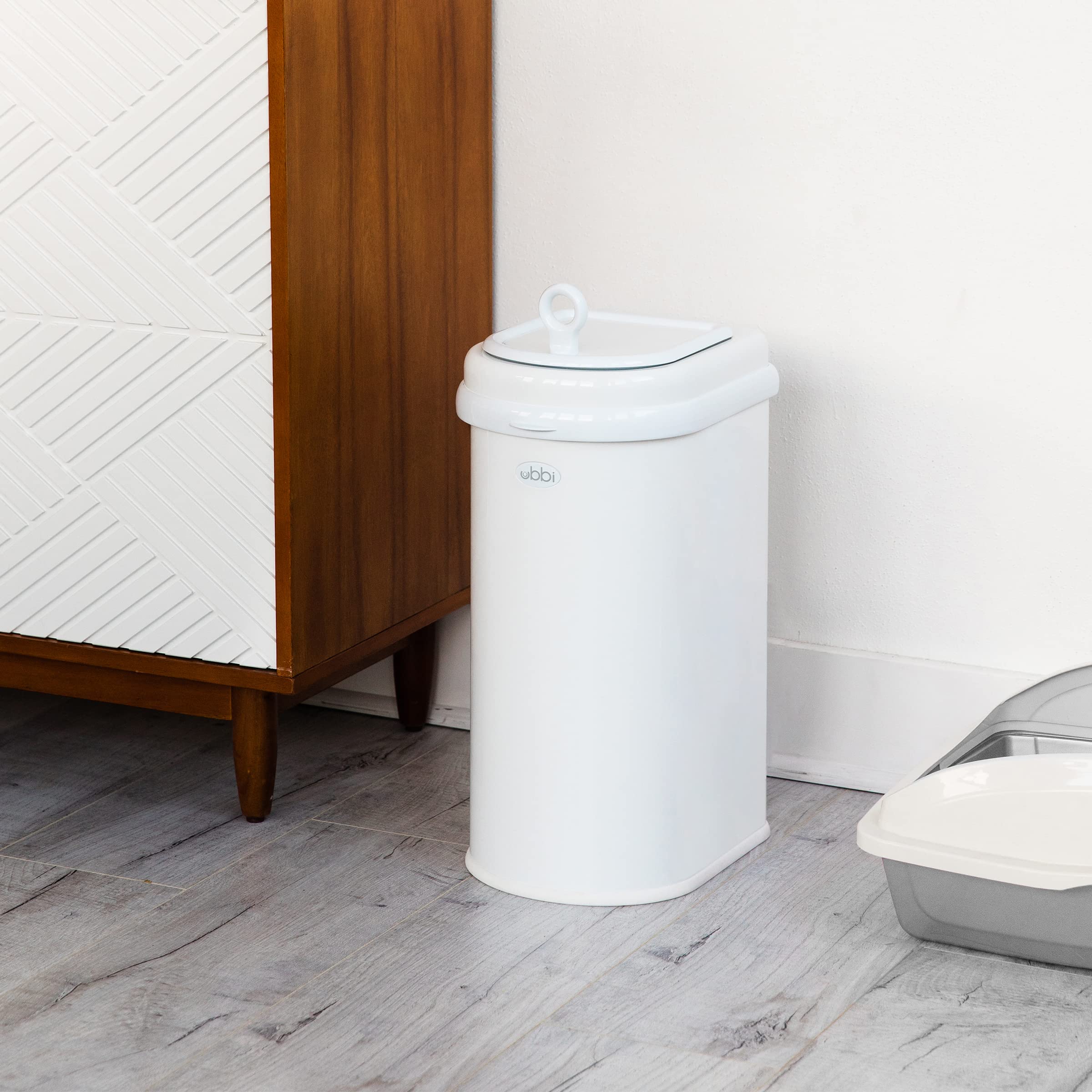 Ubbi Pet Waste Pail white finish blends with home decor
