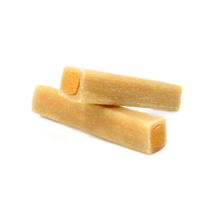 Ultra Chewy Peanut Butter Double Treat Bones close-up emphasizes digestible formula.
