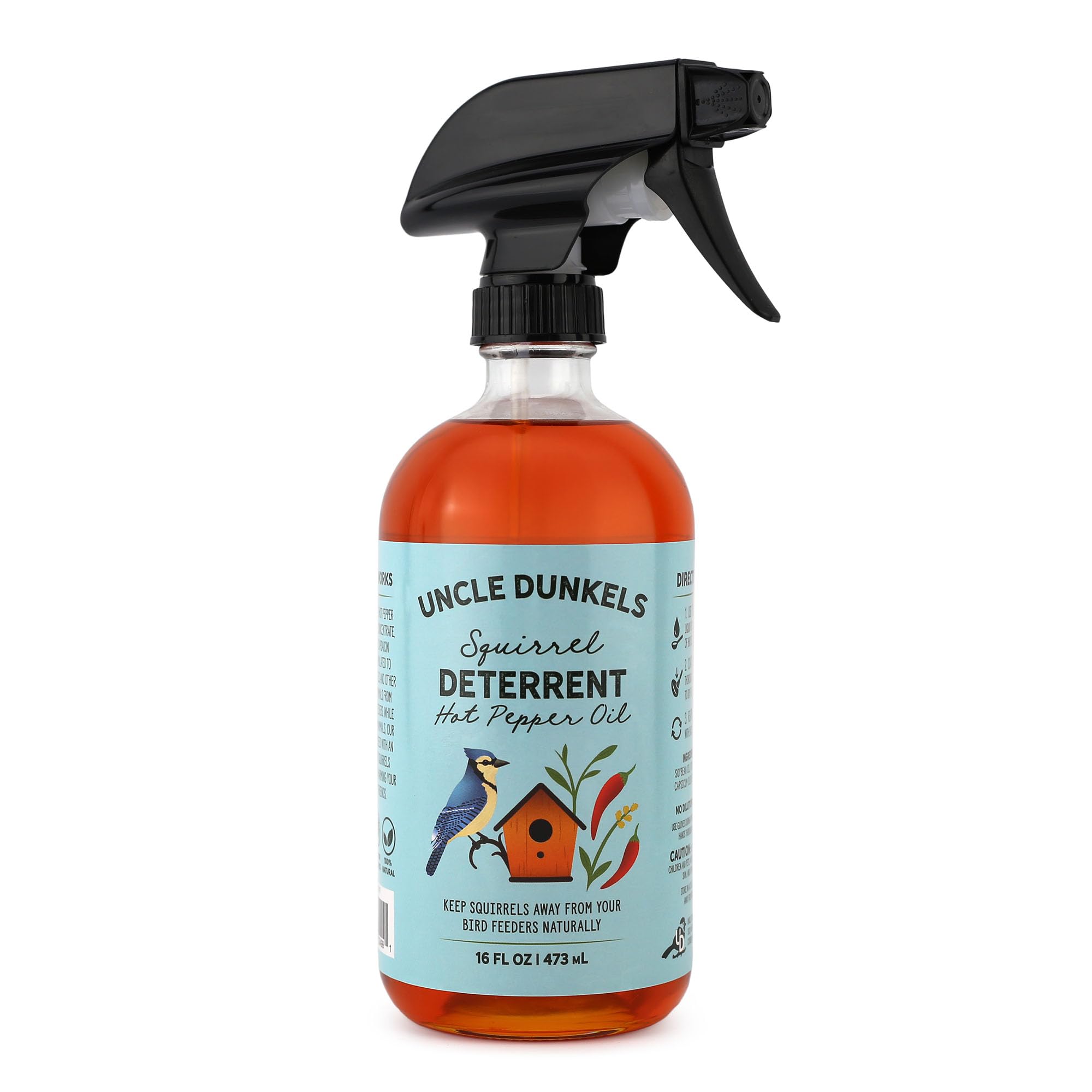 Uncle Dunkels spicy pepper deterrent bottle label shows all-natural solution for outdoor use.