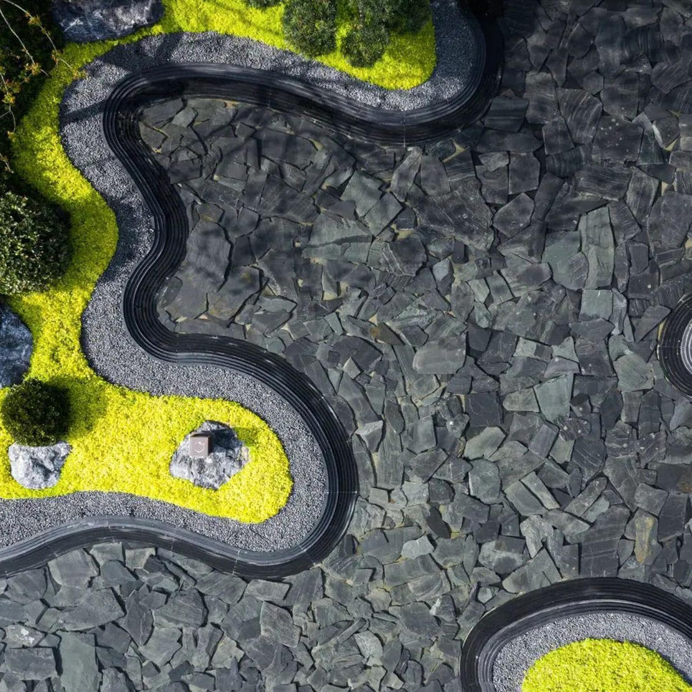 Unocho layered slate rock adds depth and durability to paludarium or vivarium designs.