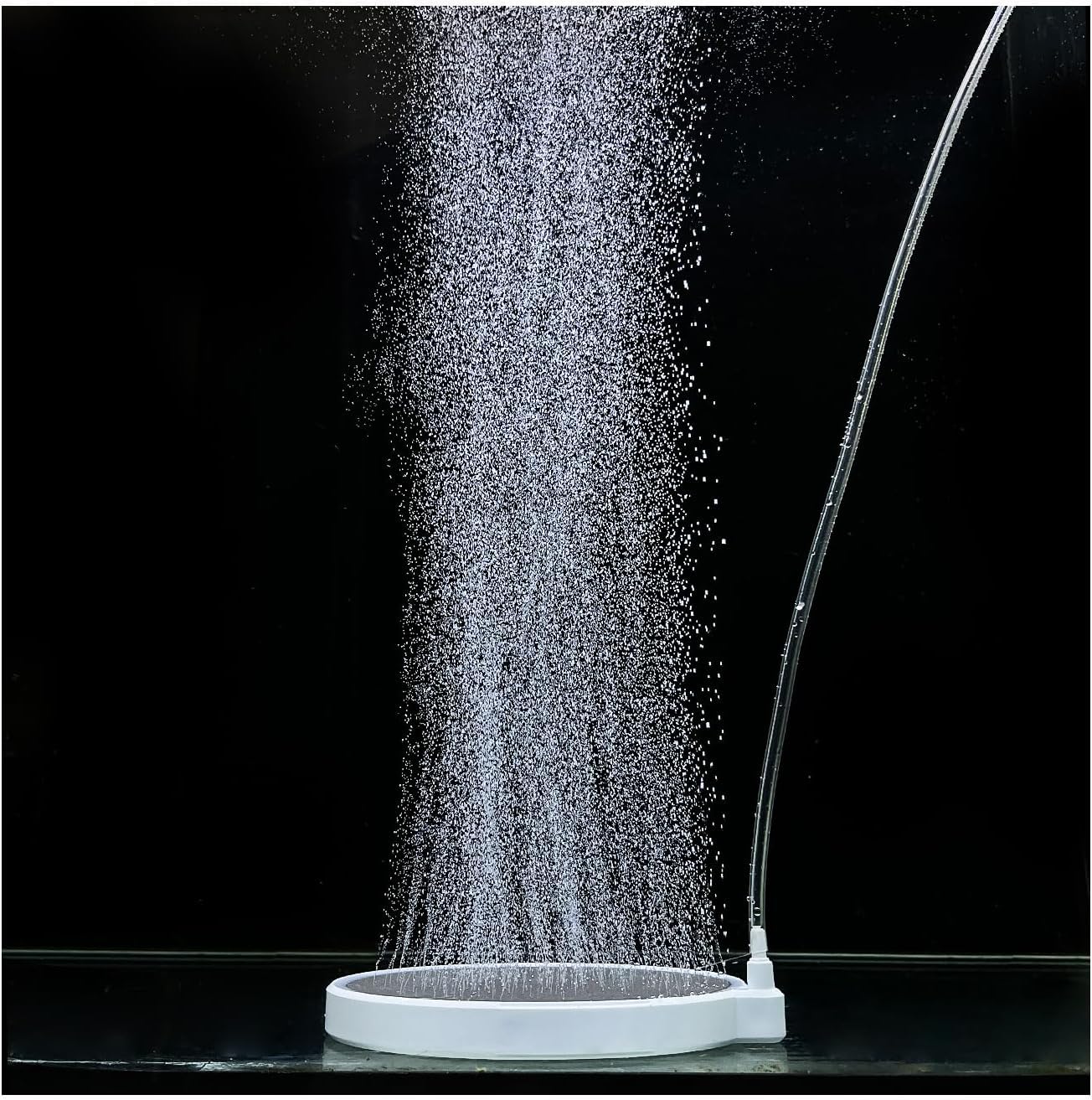 UPETTOOLS nano air stone 2 inch disk releasing tiny bubbles for efficient oxygen diffusion.