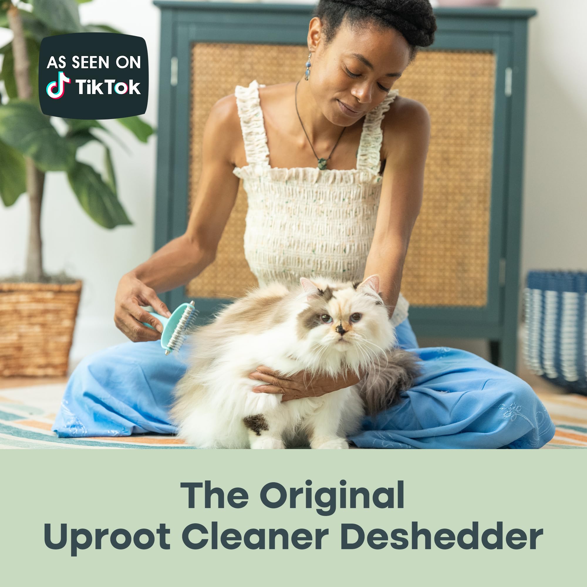 Uproot Clean undercoat rake stainless-steel-teeth: durable design for frequent use.