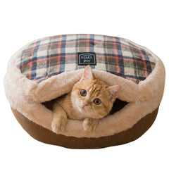 Urnat Cat Bed Cave exterior in brown, a cozy hideaway for curious cats.