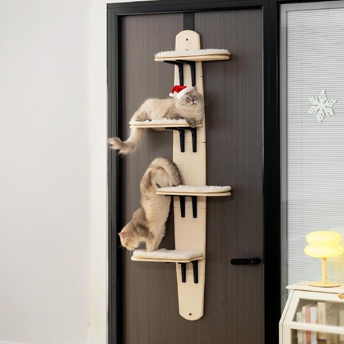 URZCT door hanging cat tree assembly in a compact doorway