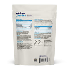 Vetnique Glandex treats in spotlight illustrating daily probiotic support.