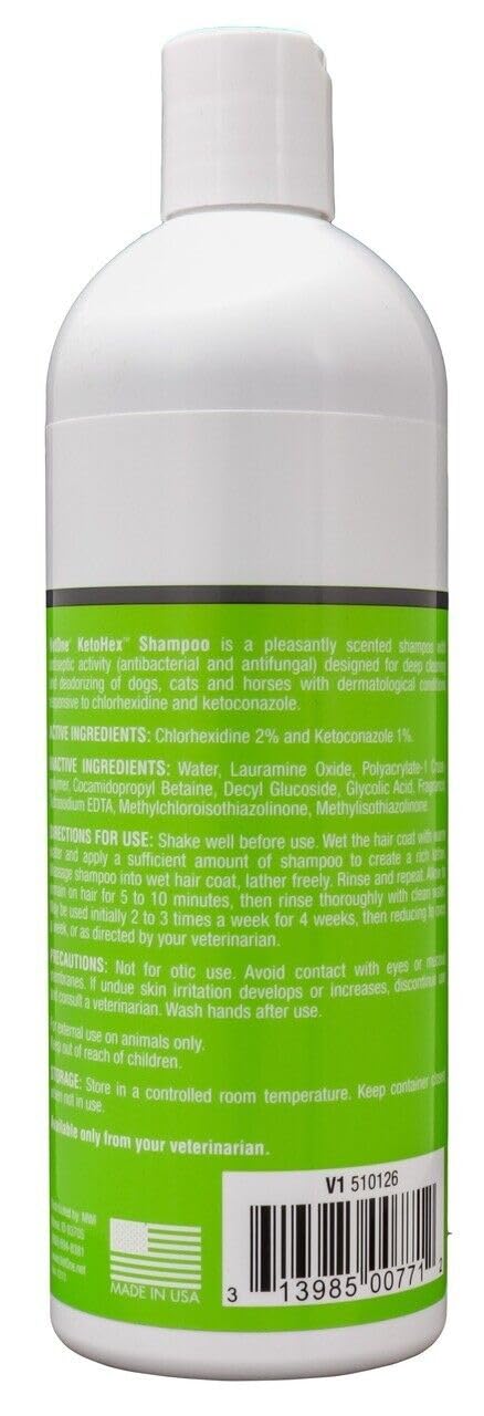 Pet being bathed showing soothing cleansing during grooming with KetoHex.