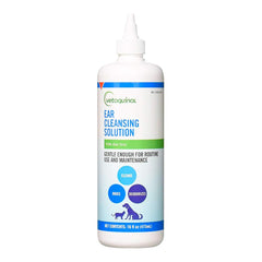 Vetoquinol ear cleansing solution bottle pour for dogs and cats, routine cleaning.
