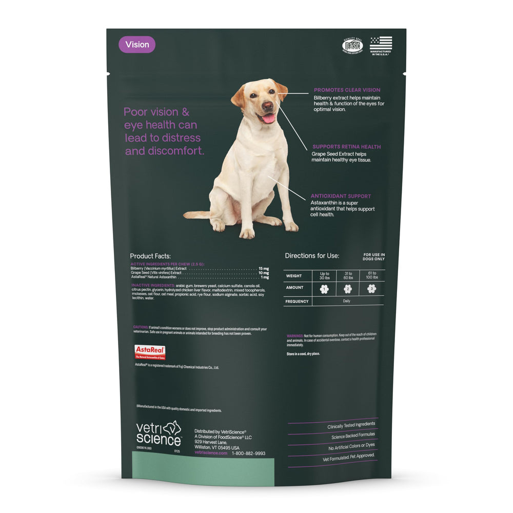 Owner giving VetriScience chews to dog as part of routine.