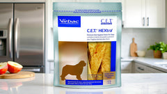 Virbac CET HEXtra chews in use by a dog during a daily oral care routine.