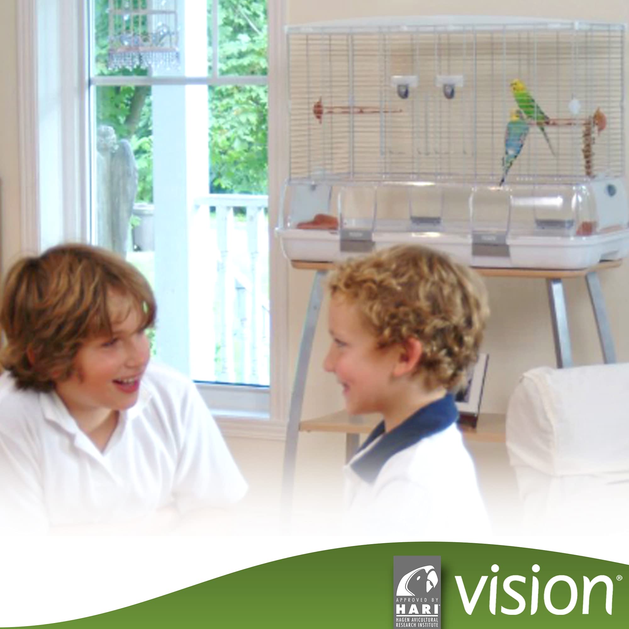 Vision M02 cage includes two waste shields and perches for comfort.