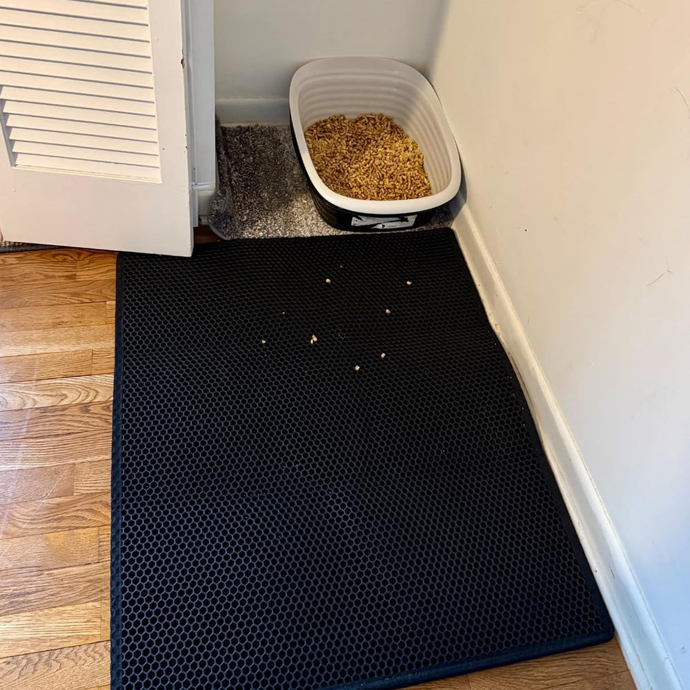 Waretary black cat litter mat blends with home décor while trapping mess.